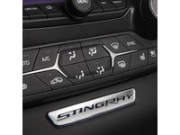 Chevrolet Corvette Instrument Panel Emblem in Chrome with Stingray Script - 23138326