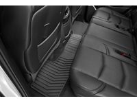 GM 22971475 Second-Row One-Piece Premium All-Weather Floor Mat in Black with Terrain Tire Tread