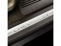 Chevrolet Front Door Sill Plates with Cocoa Surround and Chevrolet Script - 23114163